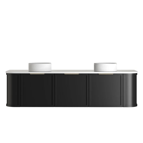 Black vanity with two white basins on a white background