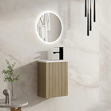 Bathroom with a round illuminated mirror above a vanity unit, featuring a modern design.