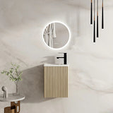 Modern bathroom setup with a wall-mounted vanity and round mirror.