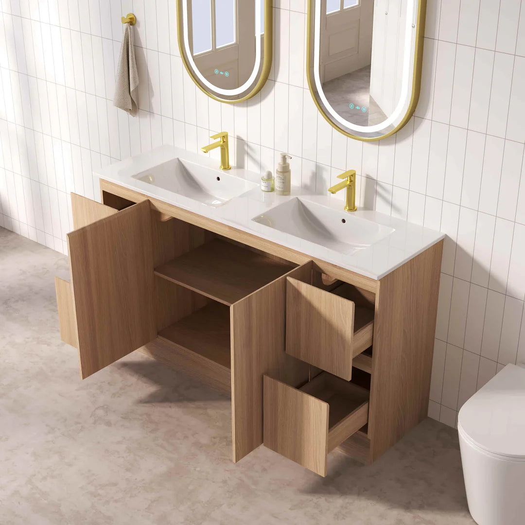 Bathroom vanity with double sink, wooden cabinets, and gold fixtures.
