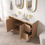 Bathroom vanity with double sink, wooden cabinets, and gold fixtures.