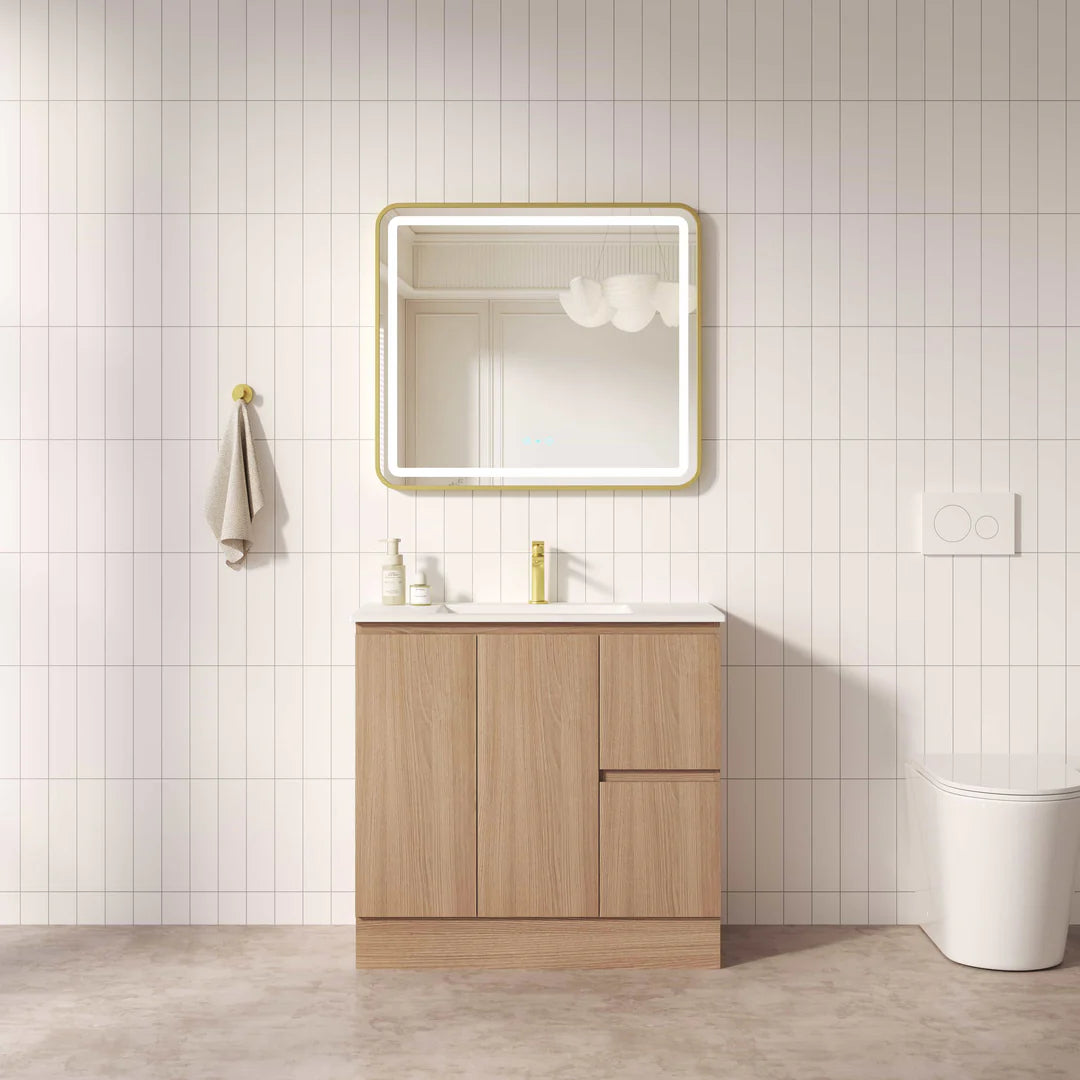 Bathroom with wooden vanity, mirror, and white tiles