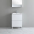 White bathroom vanity with sink against a gray wall