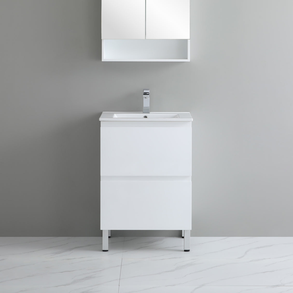 White bathroom vanity with sink against a gray wall