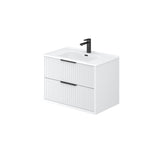 White bathroom vanity with black faucet on a white background