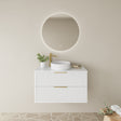 Bathroom vanity with round mirror, sink, and decorative elements on a neutral wall.