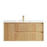 Bathroom vanity with wooden finish and white countertop on a white background