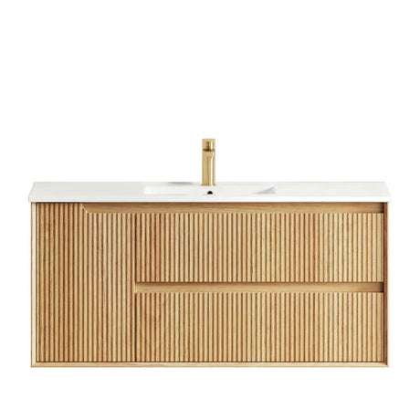 Bathroom vanity with wooden finish and white countertop on a white background