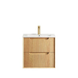 Wooden bathroom vanity with white countertop and gold faucet on a white background