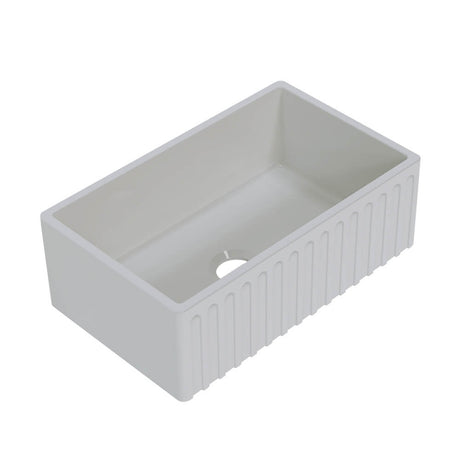 White rectangular sink with ribbed design on a white background