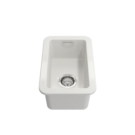 A white rectangular apron-front kitchen sink with a chrome drain, shown from a top-down perspective on a solid white background.