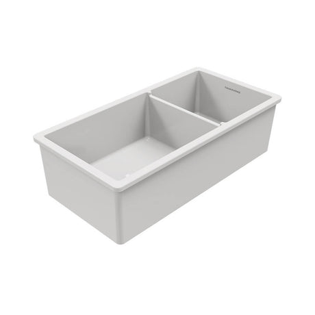 Gray double basin kitchen sink on a white background