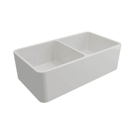 A white double-bowl farmhouse-style kitchen sink with a rectangular shape and rounded corners, shown on a plain white background.