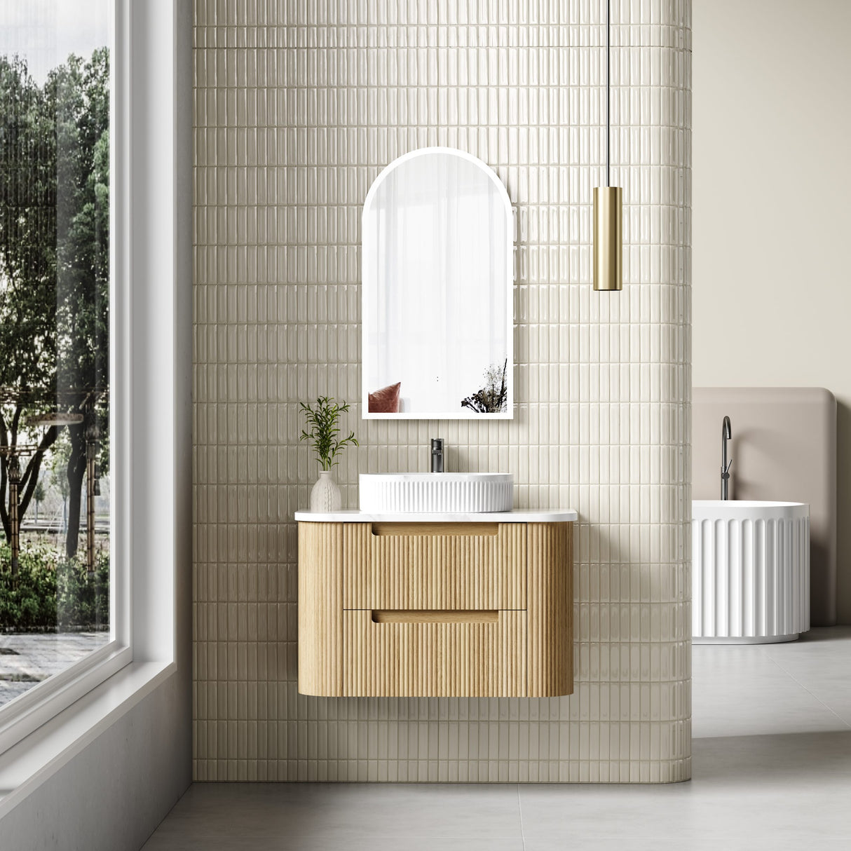 Bathroom with wooden vanity, mirror, and window view