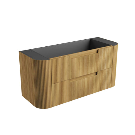 Wooden vanity with black countertop on a white background