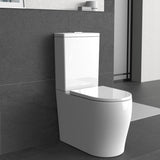 Modern toilet in a bathroom with gray tiles