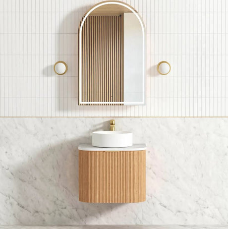 Bathroom with installed mirror and Bondi Wall Hung Fluted Vanity Curve 600mm - Woodland Oak
